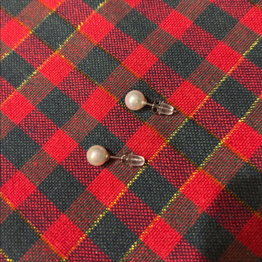 1 Set of 6 pairs of 4mm white pearl earrings. Brand new, never worn.”